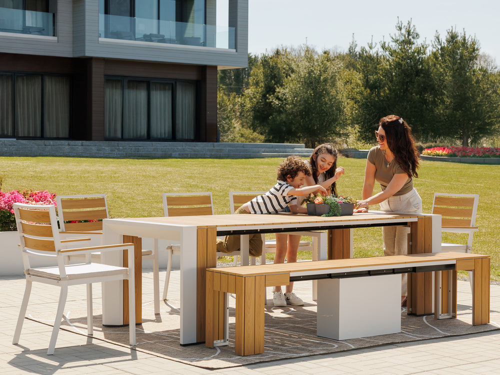 Transformer-outdoor-table-light-oak-the-host-4-panels-5-chairs-lifestyle-models-4x3